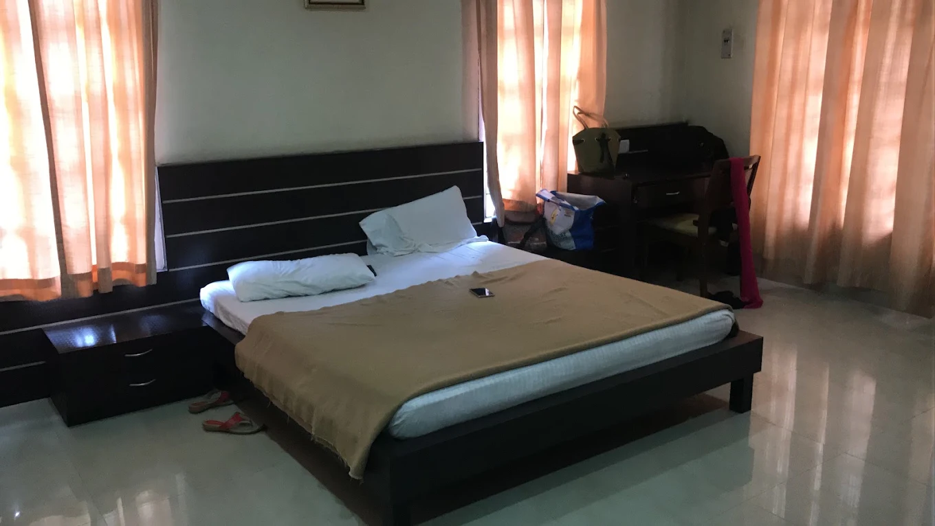Deluxe air-conditioned room at Karnataka Guest House